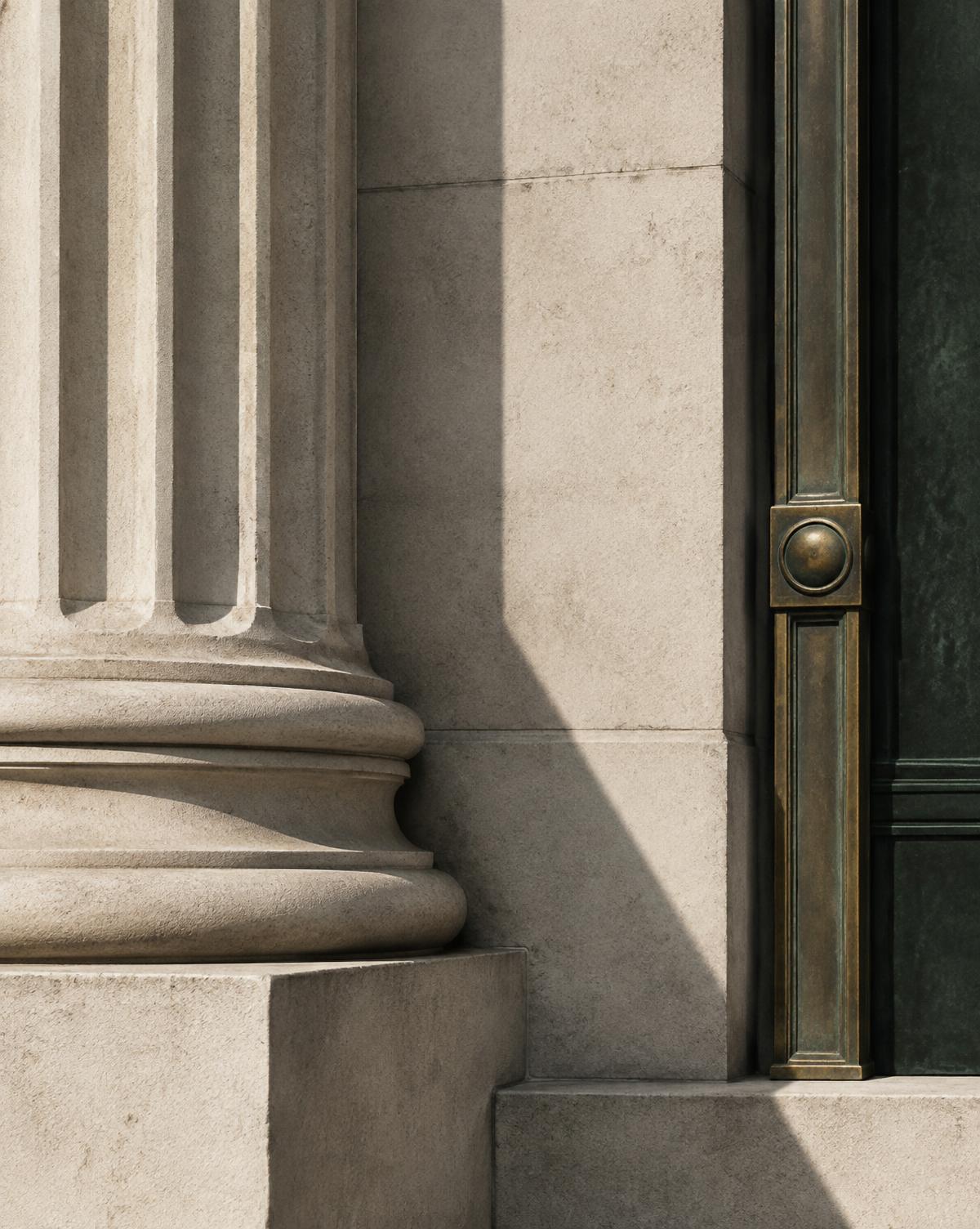 Portland stone and brass architectural detail